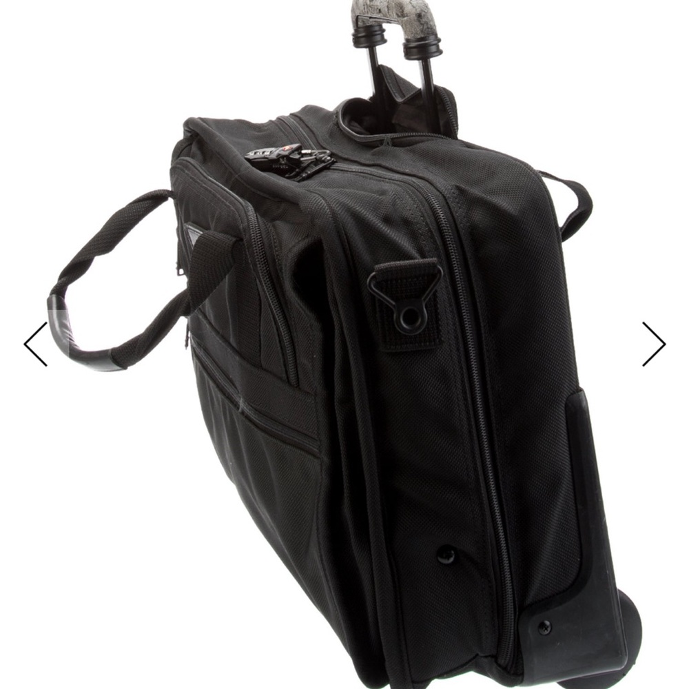 TUMI Canvas Carry-On Roller – Black